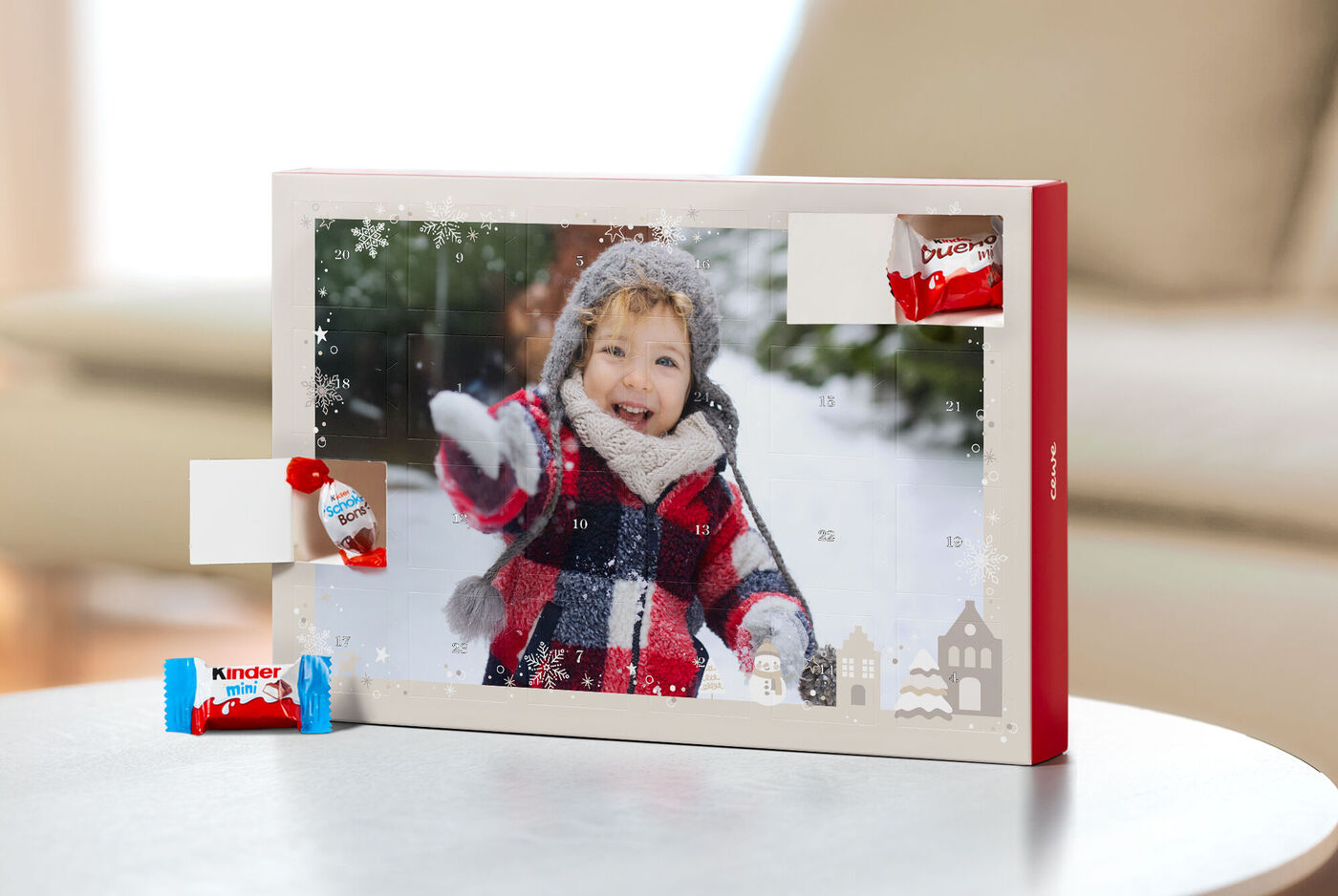 Calendrier de l'Avent personnalisé avec des chocolats kinder® et la photo d'un enfant dans la neige