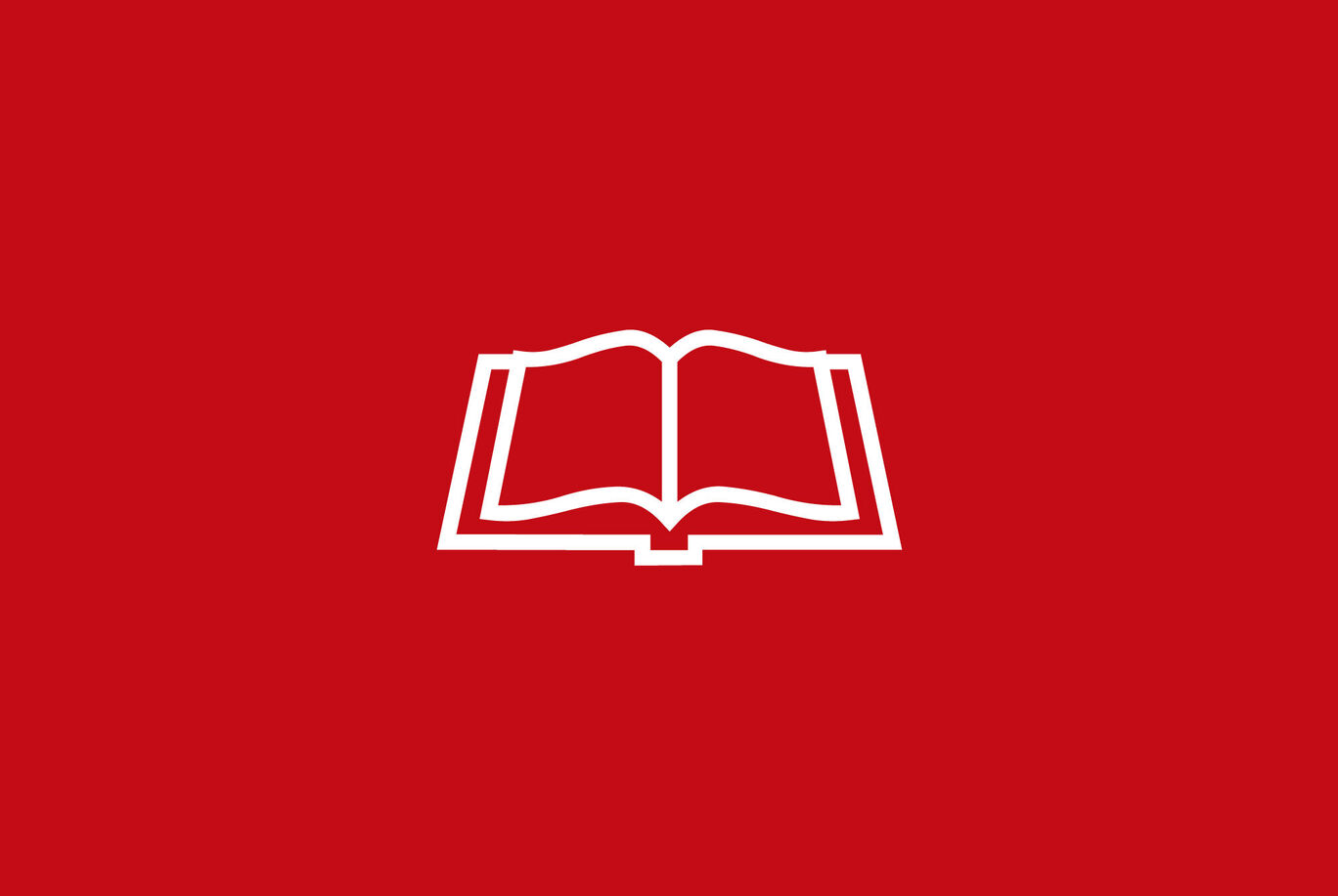 Un livre ouvert sur fond rouge